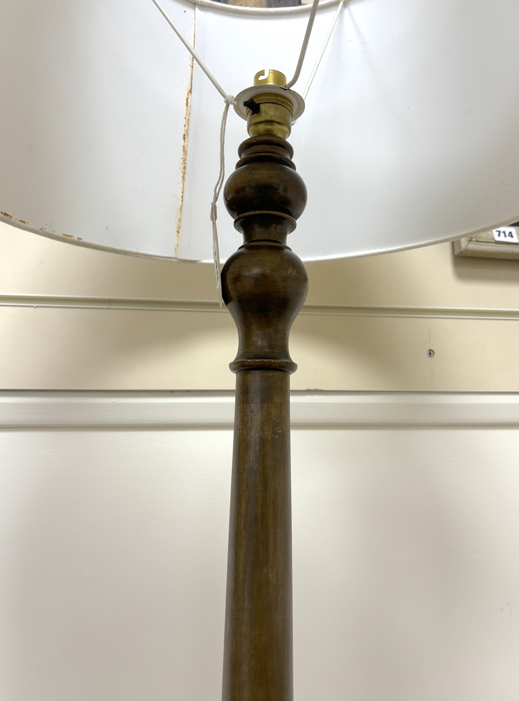 A mahogany standard lamp with shade, height including shade 170cm